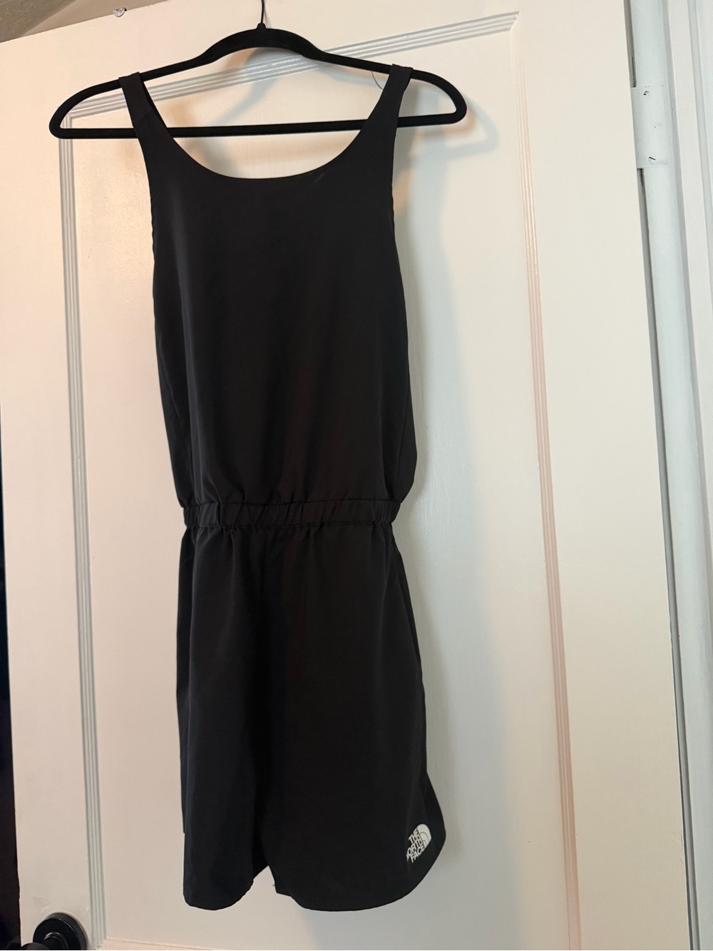 Kids The North Face black athletic one piece.